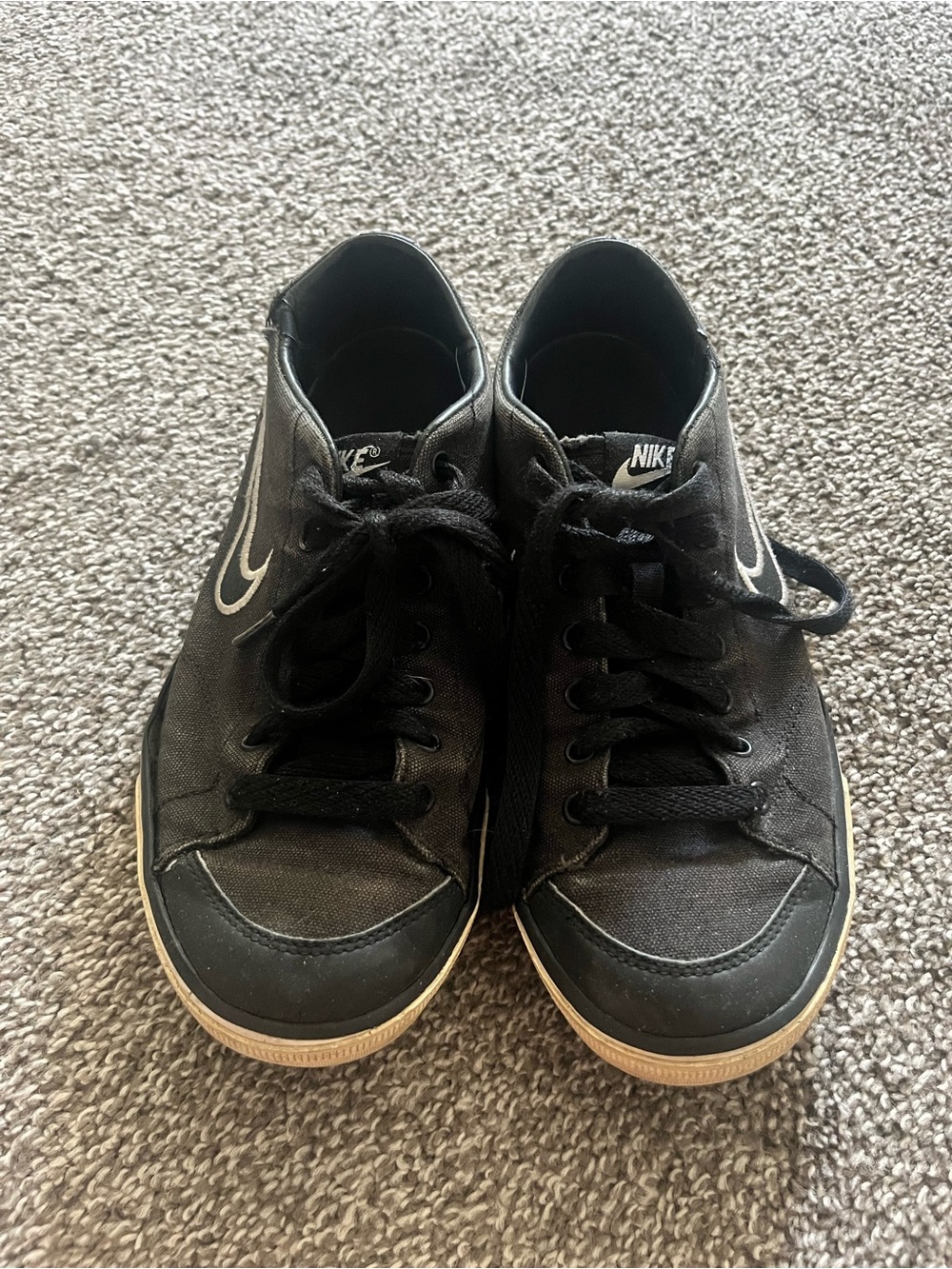 Nike Black Canvas Low-Top Sneakers with White Swoosh
